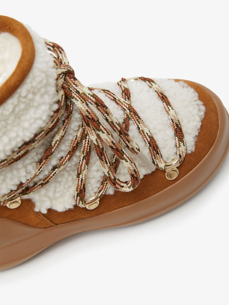 MOON BOOT Stivaletti Luna in shearling 310 CHF donna marrone