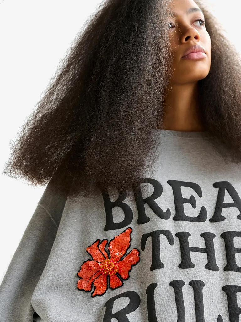 ESSENTIEL ANTWERP felpa girocollo ixperience con decorazioni di paillettes donna