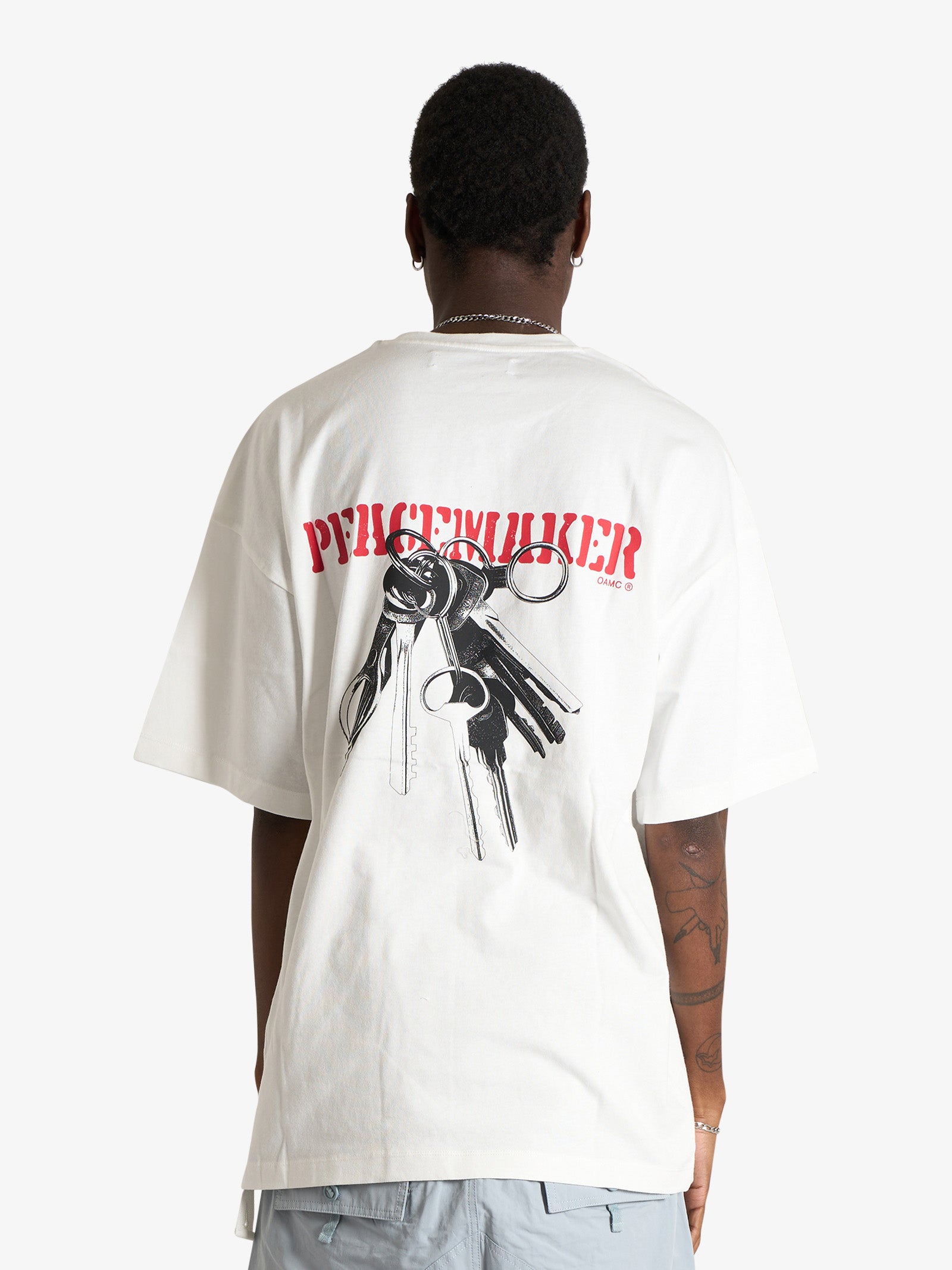 OAMC PEACEMAKER oversize tee keys print t-shirt white man
